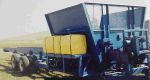 Bale feeder with liquid feed Pump